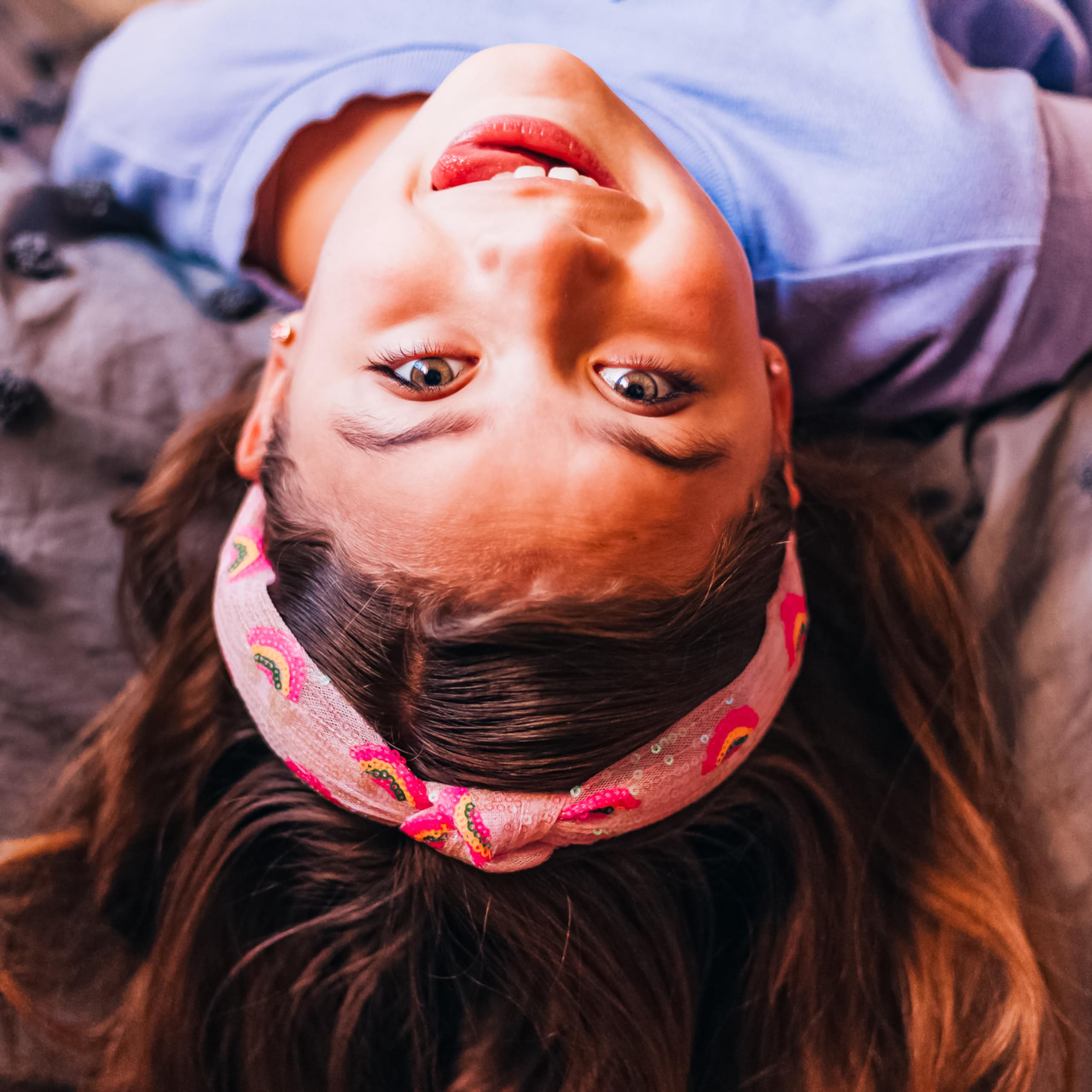 FROG SAC knotted headband detail adds bold fashion flair.