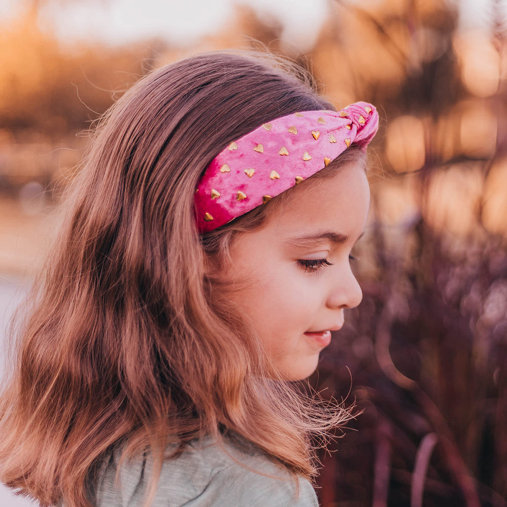 FROG SAC heart headband on a girl, pink velvet knot adds cute style to outfits.