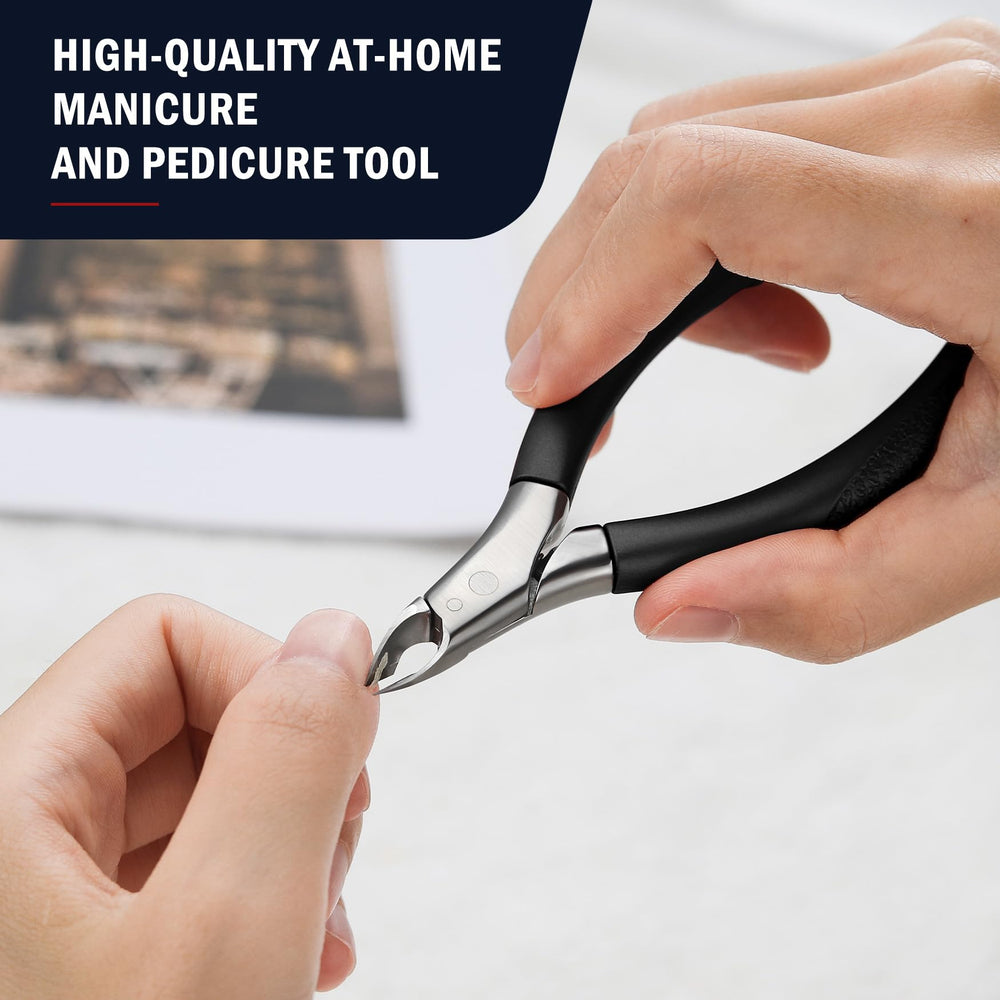 FVION cuticle trimmer in hand showing compact size ideal for travel.