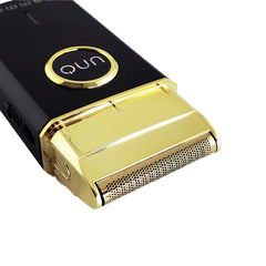 Gamma+ foil head close-up shows gold titanium surface for sensitive skin comfort.