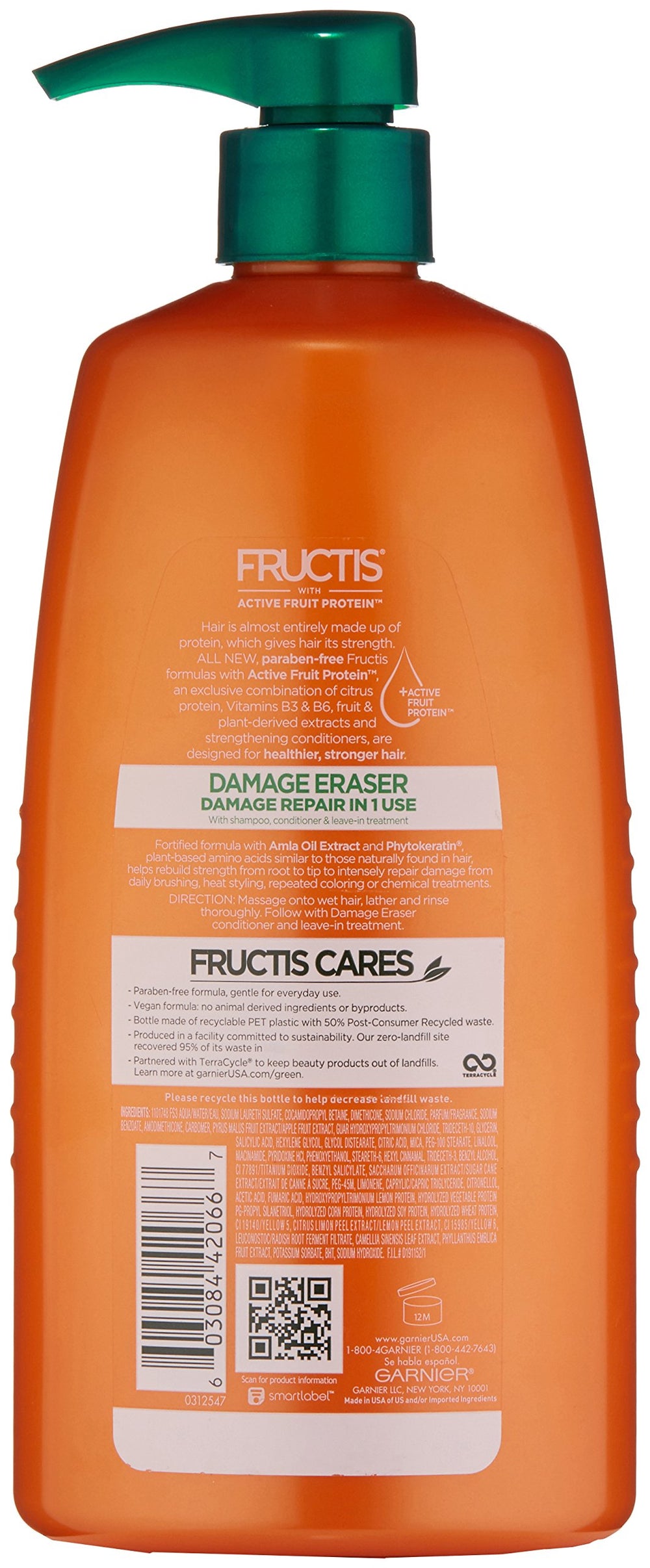 Garnier Fructis Damage Eraser Shampoo on hair during application for strength and repair.
