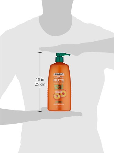Garnier Fructis Damage Eraser Shampoo packaging displayed with 33.8 oz size and clean formula.
