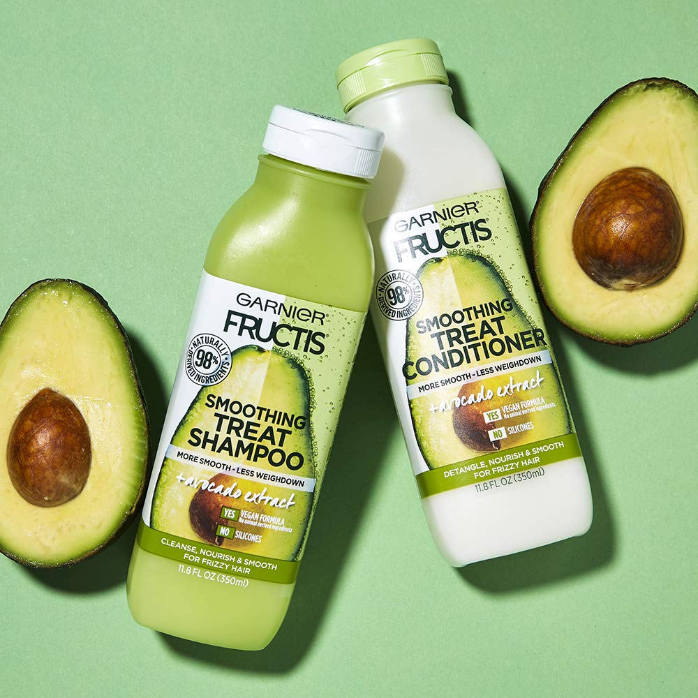 Garnier Fructis recyclable bottle symbol emphasizing eco-friendly packaging.
