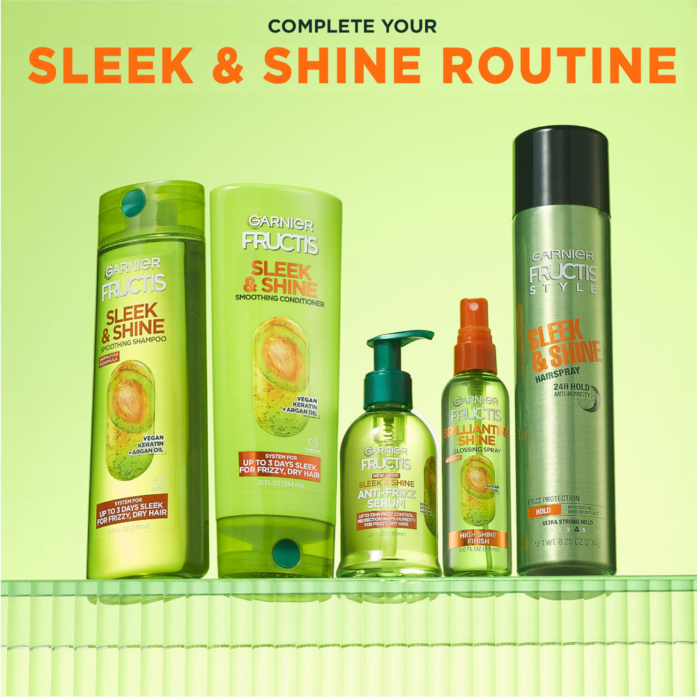 Garnier Fructis Sleek & Shine hairspray bottle with fruity fragrance for refresh scent.