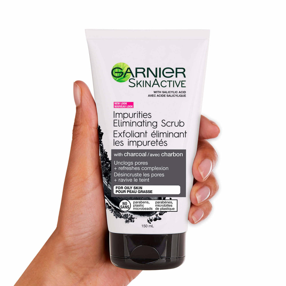 Garnier SkinActive Charcoal Scrub drawing out dirt close-up shows charcoal action.