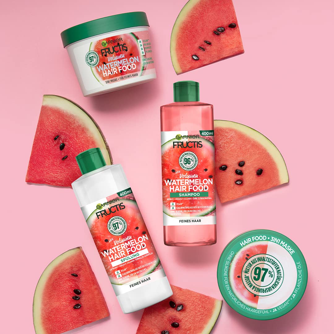 Garnier Watermelon Hairfood leave-in application on hair strands for lasting softness