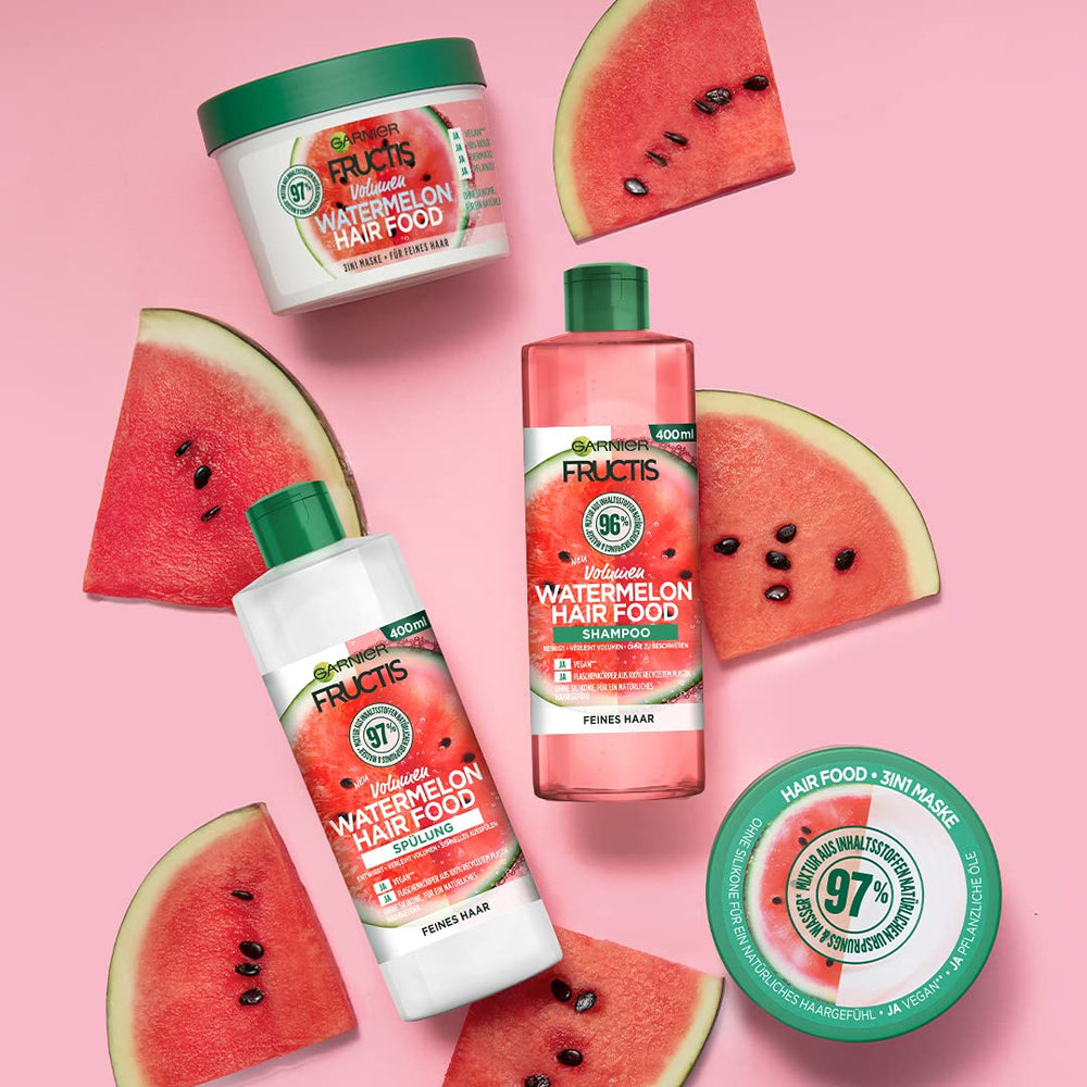 Garnier Watermelon Hairfood leave-in application on hair strands for lasting softness