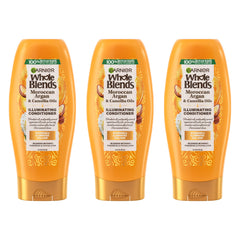 Garnier Whole Blends conditioner bottle with argan and camellia oils for radiant shine