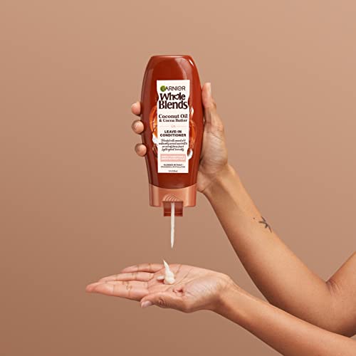 Garnier Whole Blends hair-care routine on bathroom shelf for easy use