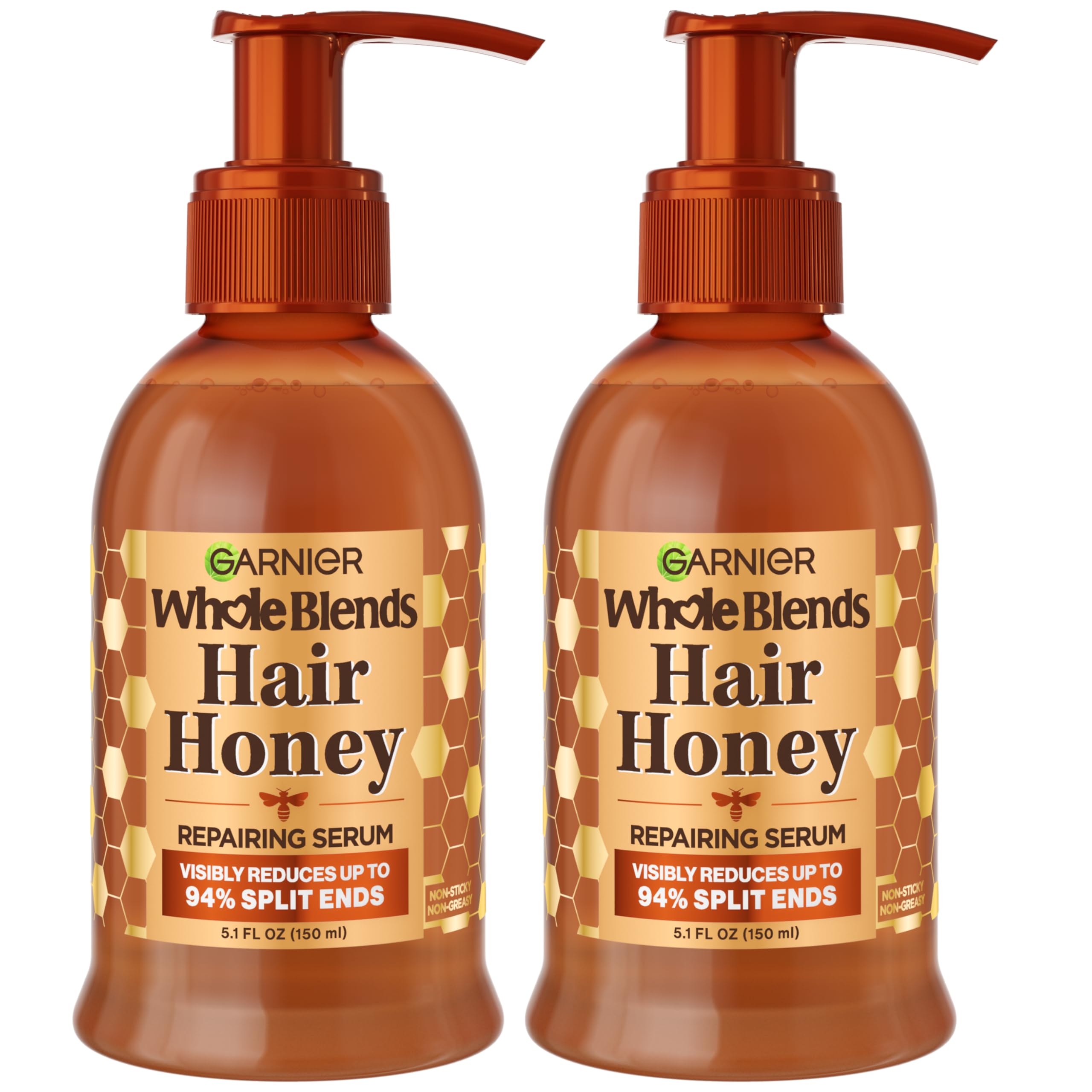 Garnier Whole Blends Honey Treasures serum bottle demonstrates non-greasy repair for damaged hair