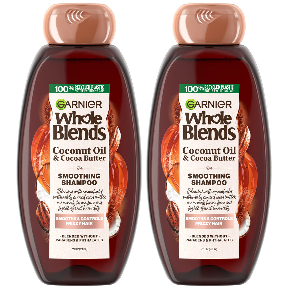 Garnier Whole Blends smoothing shampoo twinpack bottle showing frizz control.