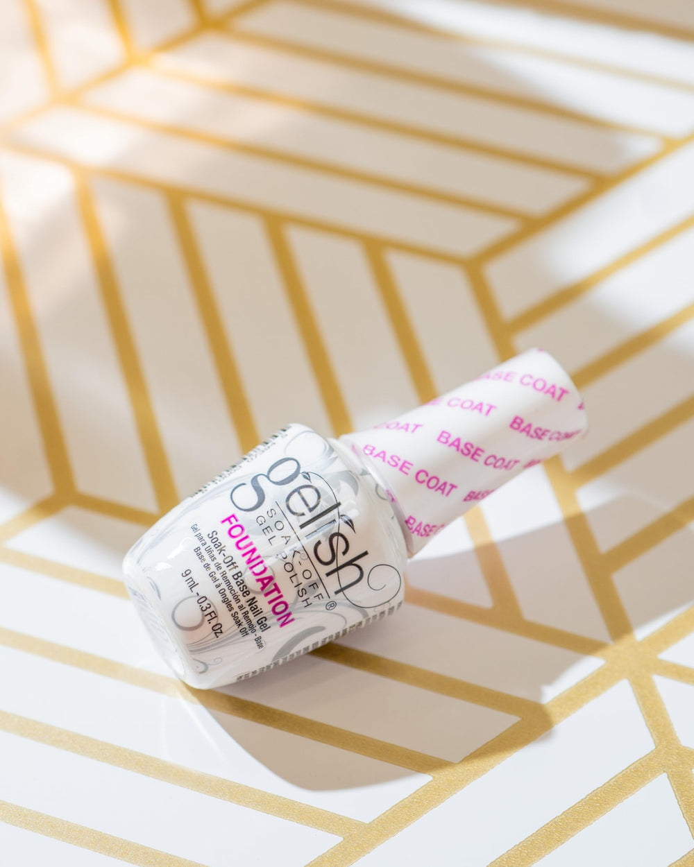Gelish Mini Foundation Base Coat bottle close-up emphasizing quick-dry formula for busy manis