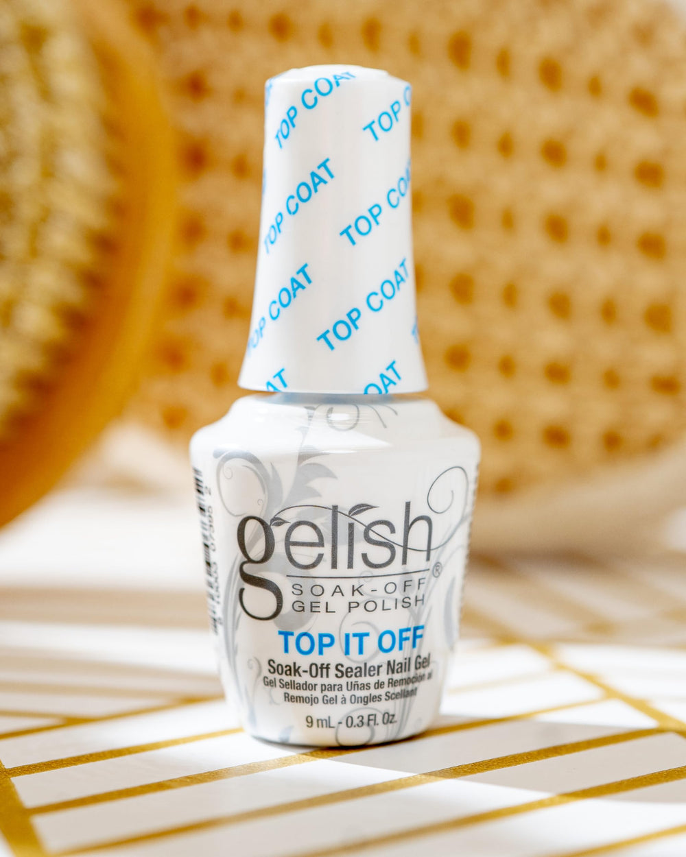 Gelish Top It Off application shot highlights quick cure and durable shine.