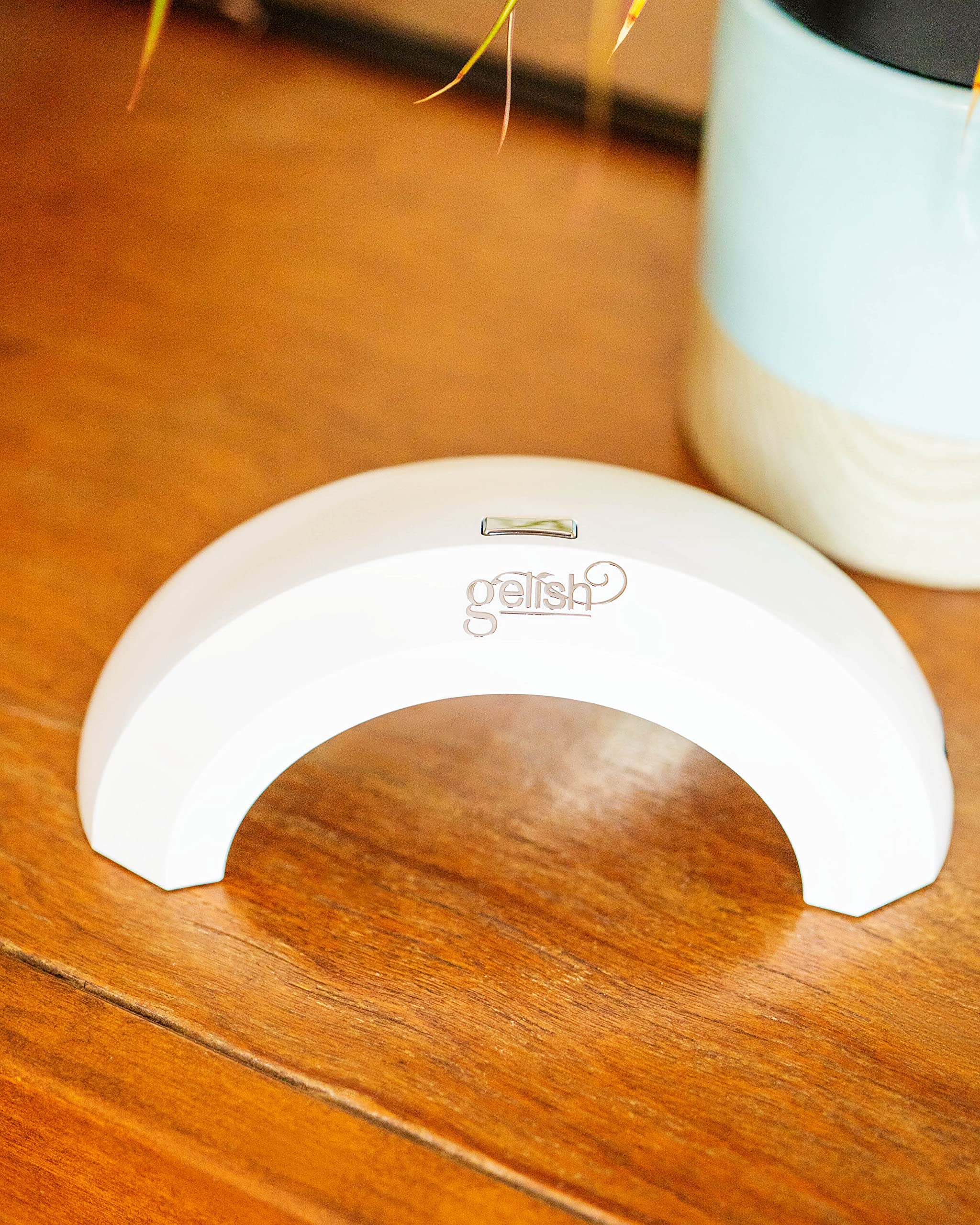 Gelish Pro 45 Mini LED Light four-finger cure close-up — speeds gel manicures with even coverage.