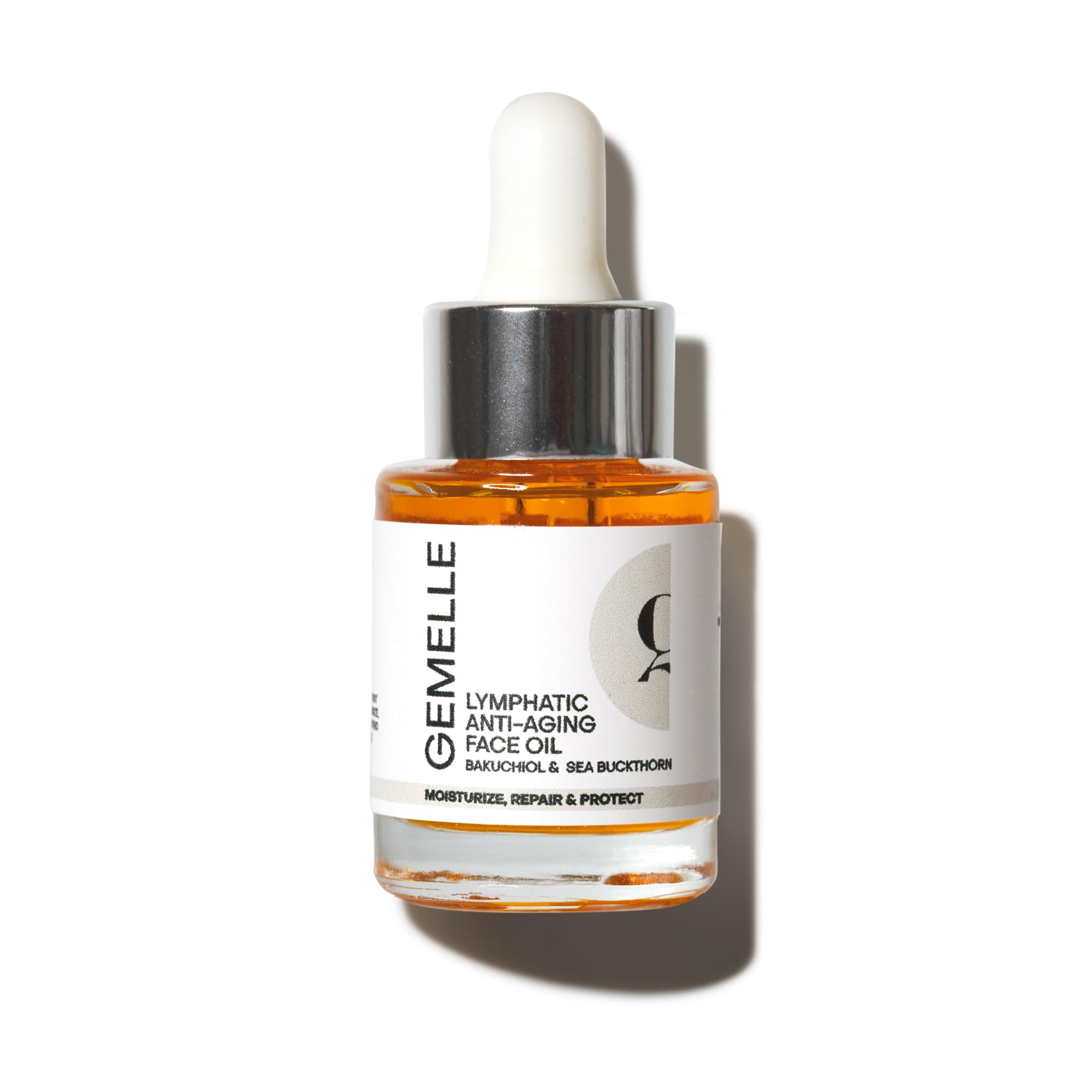 GEMELLE Lymphatic Anti-Aging Face Oil bottle showcases nutrient-rich formula for radiant, nourished skin.