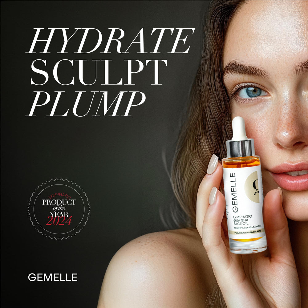 GEMELLE oil application with a gua sha tool for sculpted facial contours.