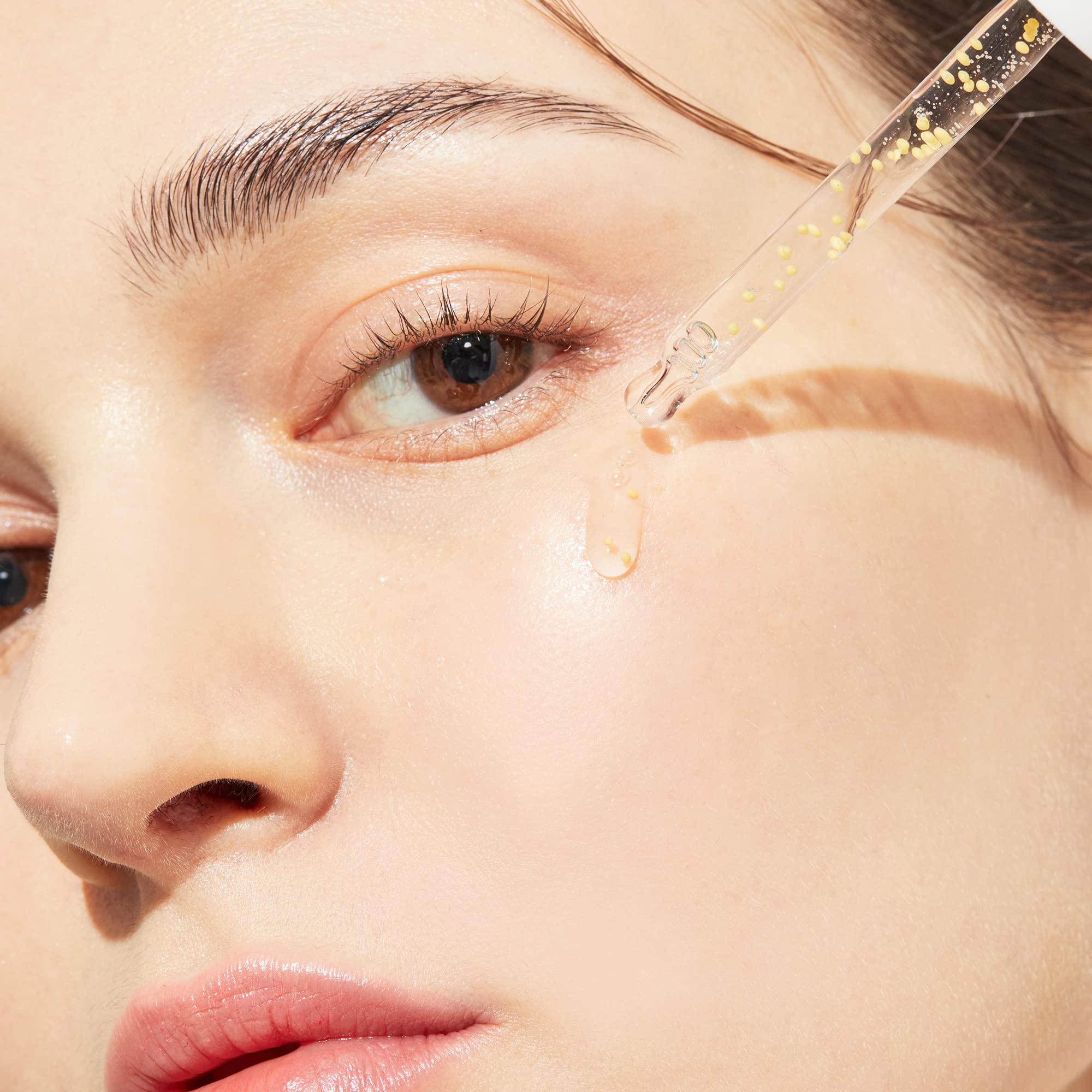 genabelle pdrn vita toning ampoule vitamin beads close-up highlighting fresh active ingredients