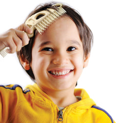Genuine Fred Bonehead two-sided brush and comb folded compactly fits pockets or bags.
