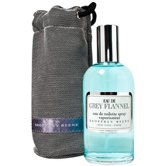 Geoffrey Beene Grey Flannel lifestyle shot suggests confident evenings with woody notes.