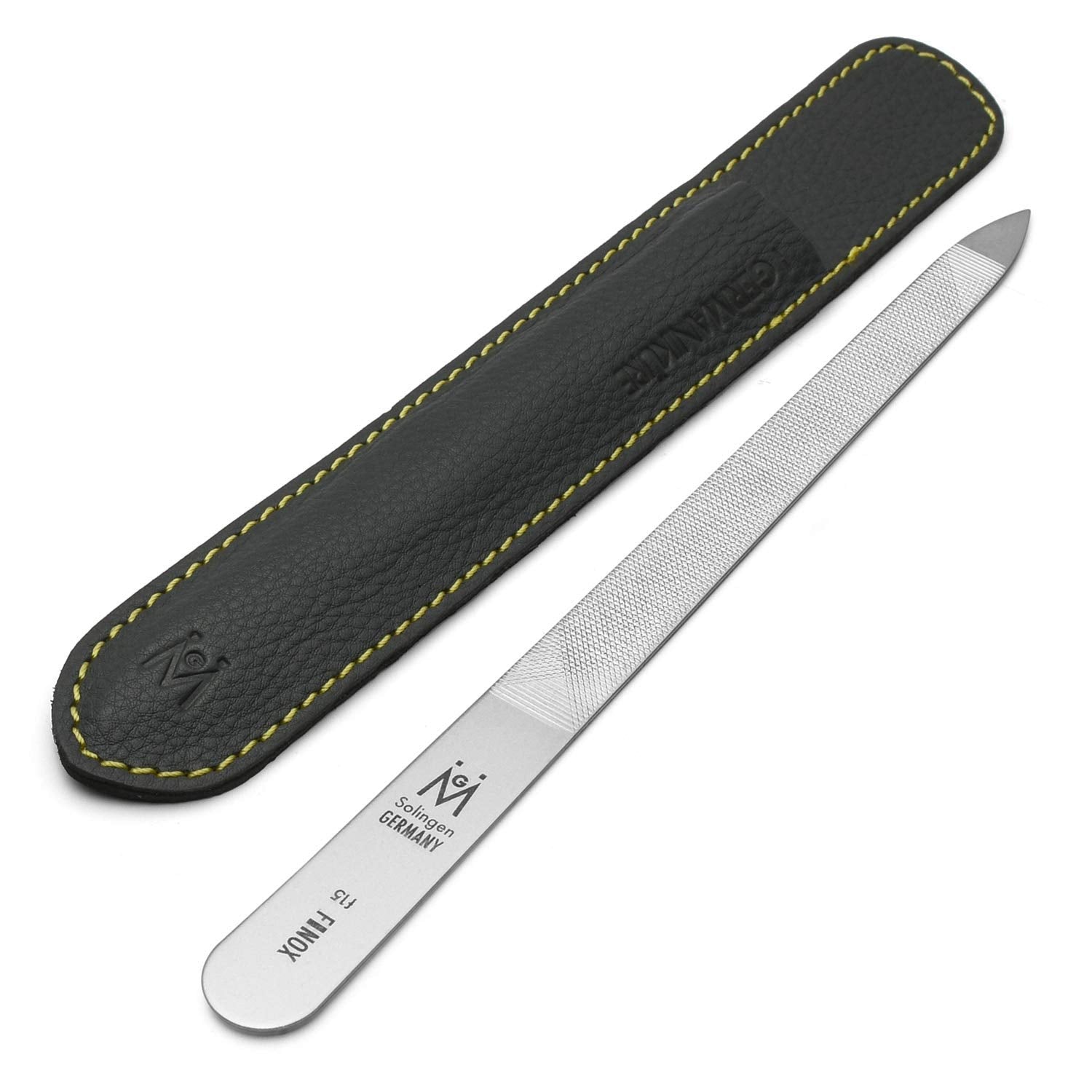 GERMANIKURE file in use shaping nail edge with steady control.