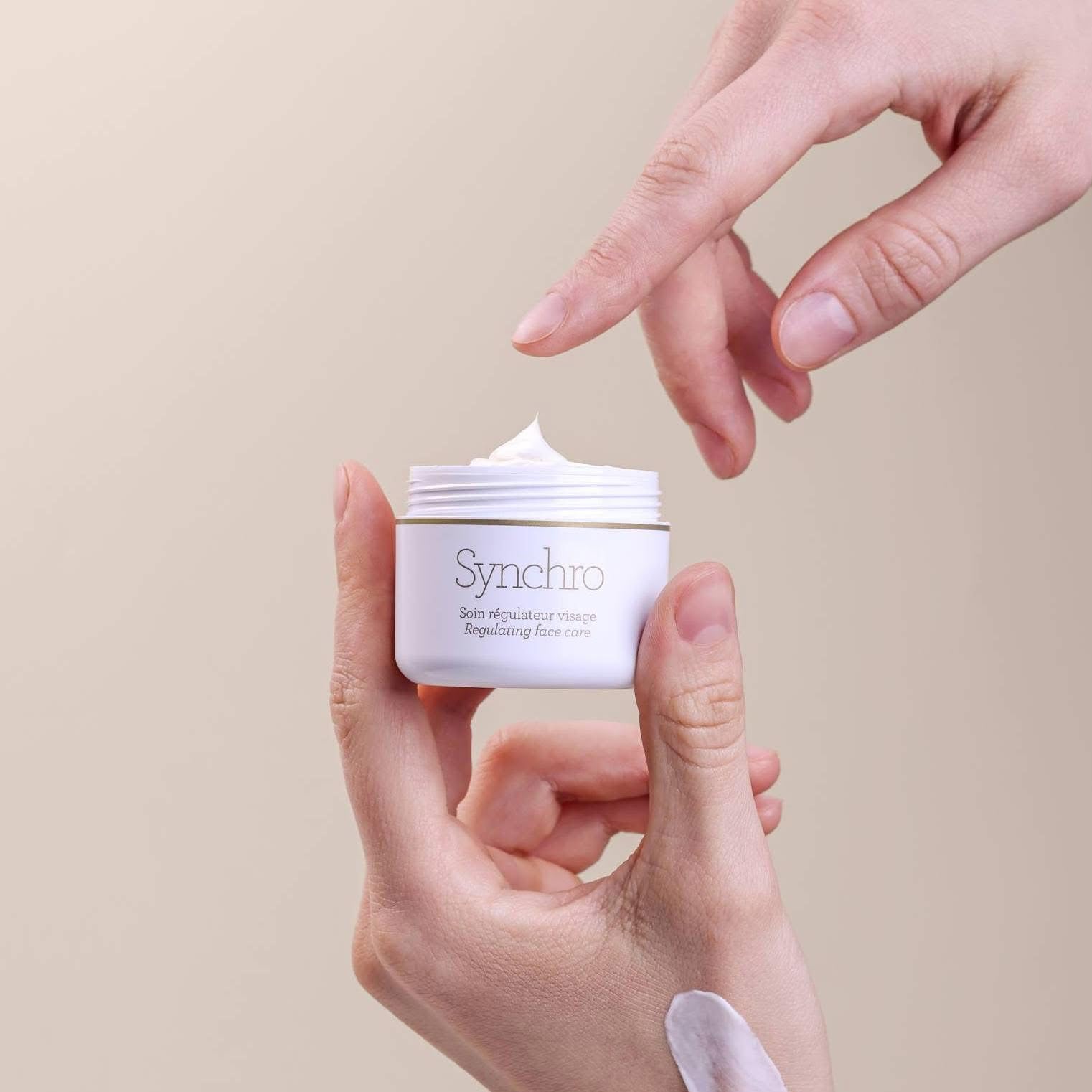 Gernetic Synchro Cream being applied in a skincare routine for daily revitalization.