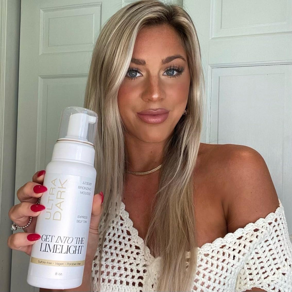 Get Into The Limelight Ultra Dark mousse dispenser demonstrates controlled application for even color.