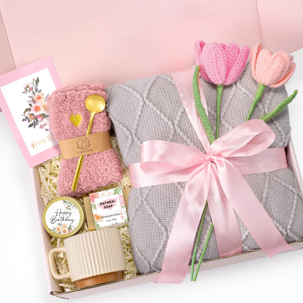 GiftHarbor birthday gift box with cozy blanket and mug for warm celebrations.