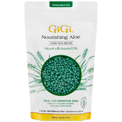 GIGI Nourishing Aloe hard wax beads pour into warmer for precise, skin-friendly at-home waxing.