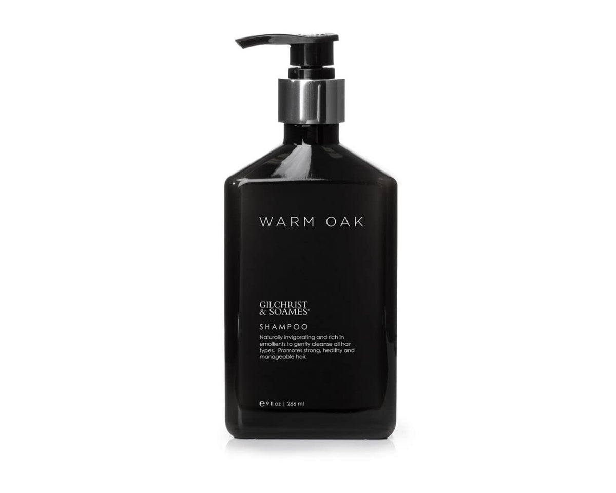 Gilchrist & Soames Warm Oak Shampoo bottle front promotes healthy-looking hair with a fresh aroma.
