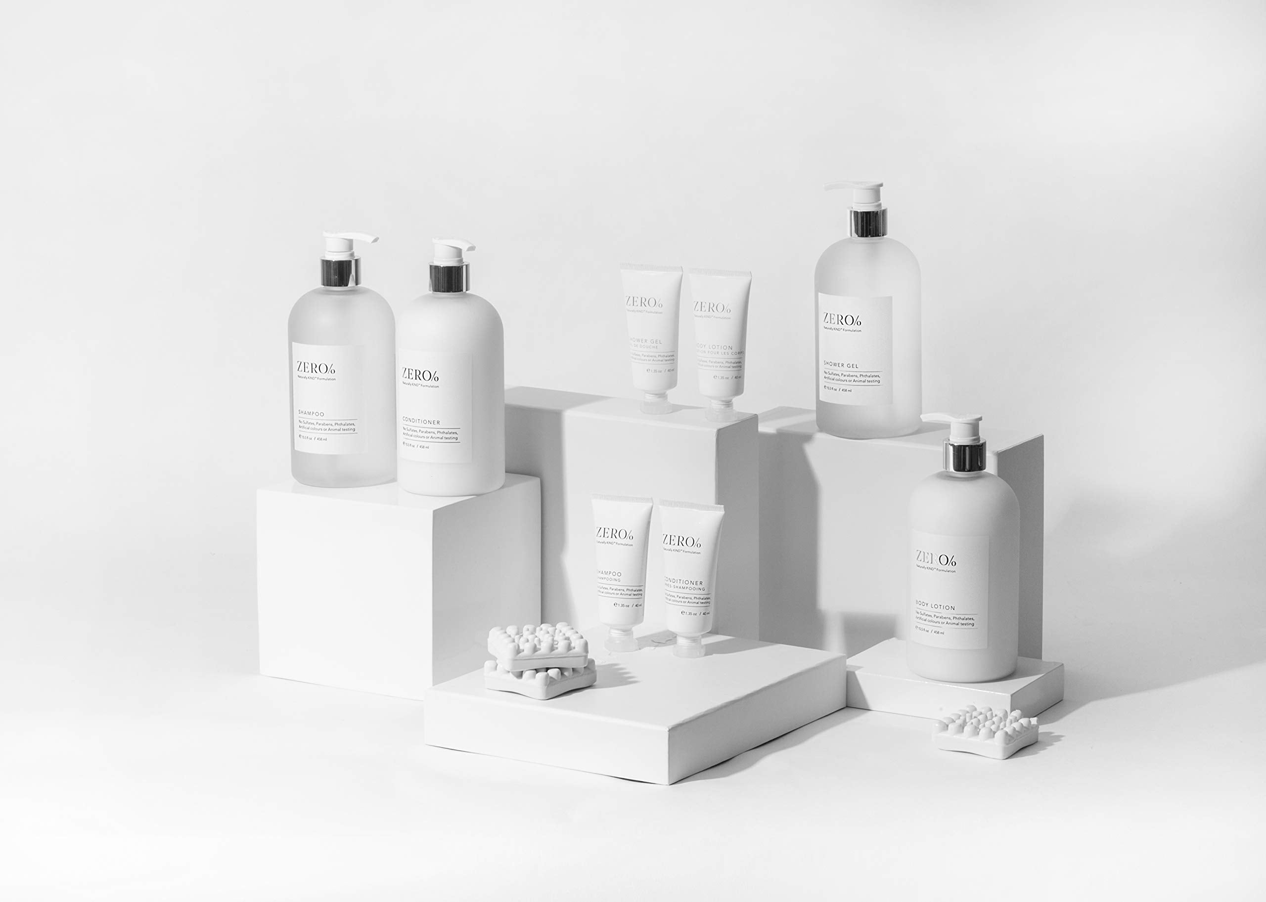 Gilchrist & Soames Zero% Collection shampoo packaging display emphasizes refined branding.