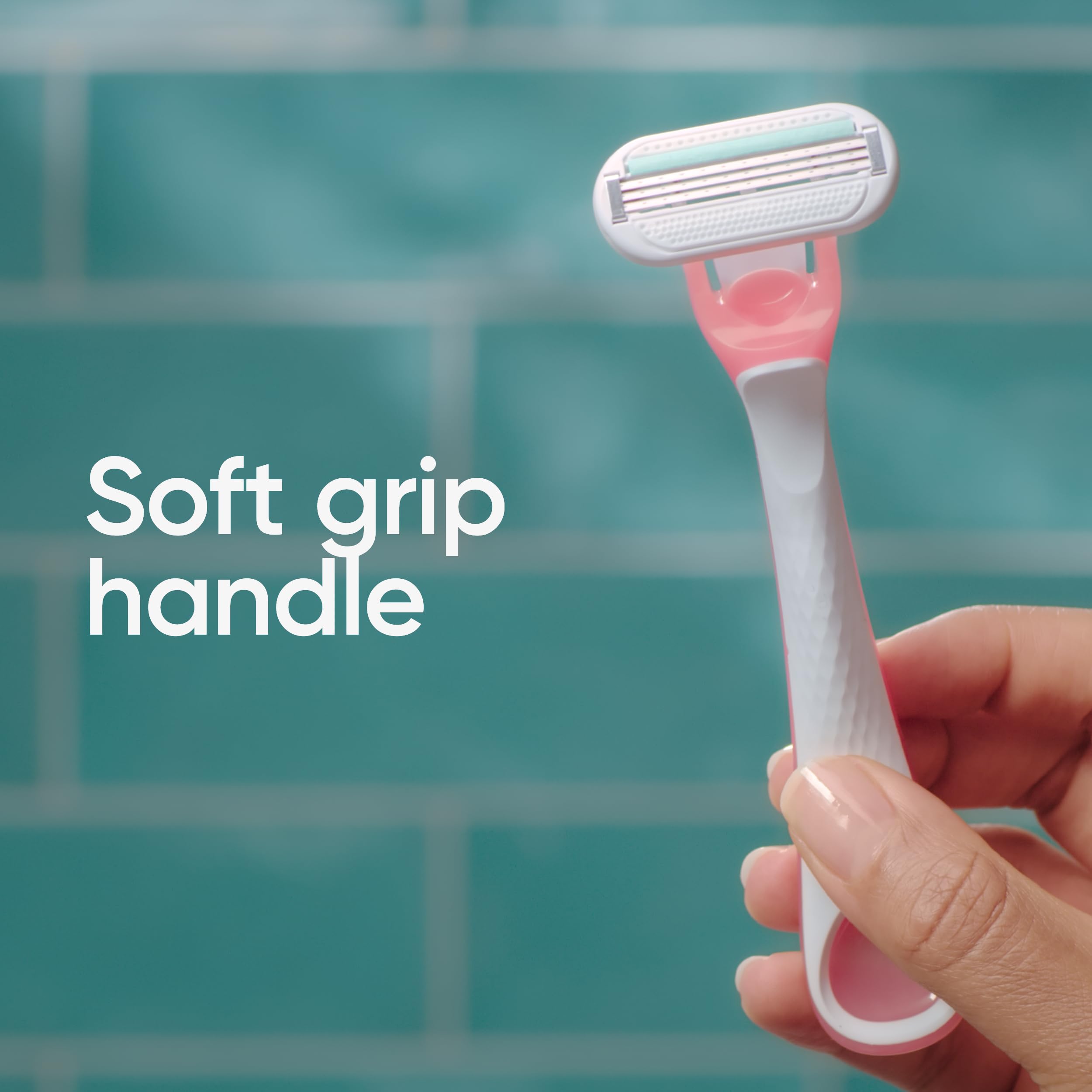 Gillette Venus razor in hand for scale to show compact, travel-friendly size