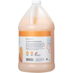 Ginger Lily Farms Coco Mango shampoo bottle highlights rich lather for long-lasting moisture.