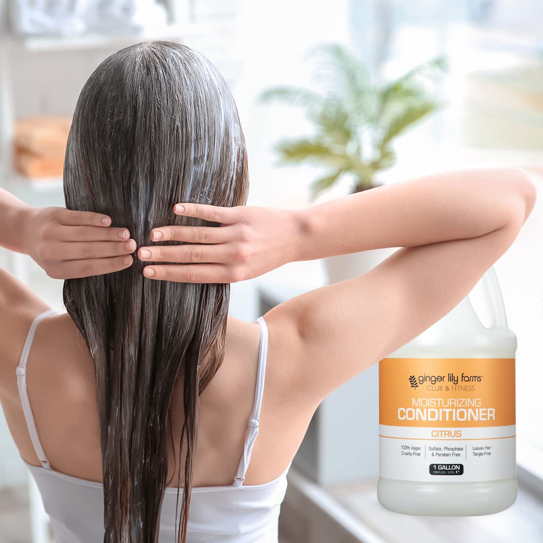 Ginger Lily Farms conditioner on shiny hair shows improved manageability.