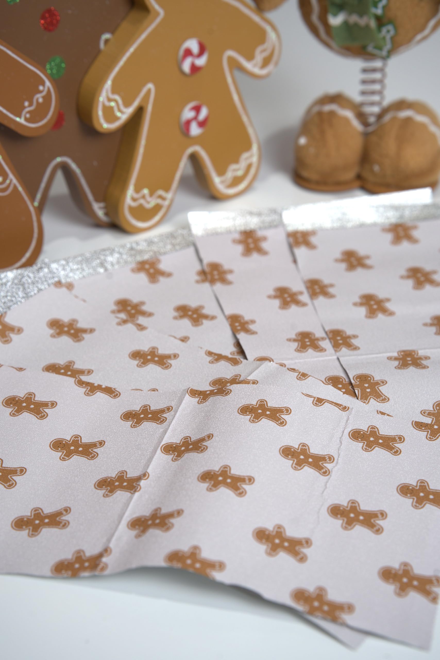 Gingerbread aluminum foil sheets for durable barrier during color application.