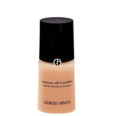 Giorgio Armani Luminous Silk Foundation No. 5.5 bottle closeup shows satin glow for natural radiance.