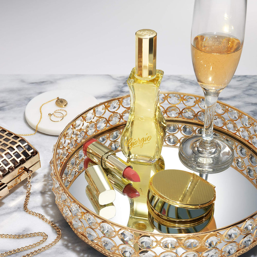 Giorgio Beverly Hills For Women display with bottle and packaging, premium presentation for gifting.