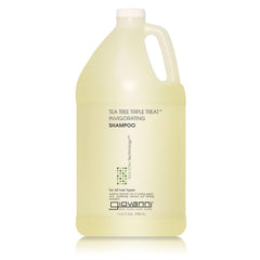GIOVANNI Tea Tree Invigorating Shampoo bottle pour refreshes scalp for a fresh start.