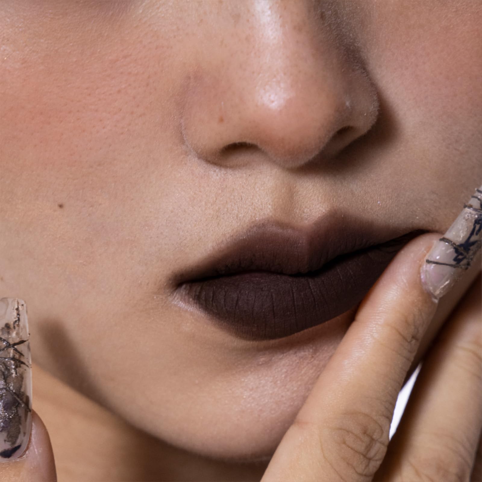 GIRLCULT Matte Lip Stain swatch reveals rich shade with sparkle depth.