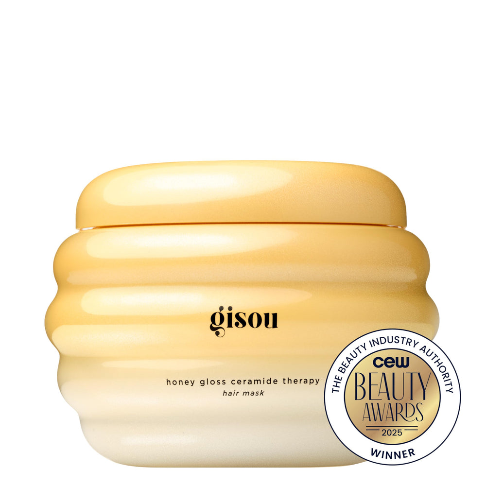 Gisou Bee Garden Oil Blend bottle showcases antioxidant-rich nourishment for soft strands.
