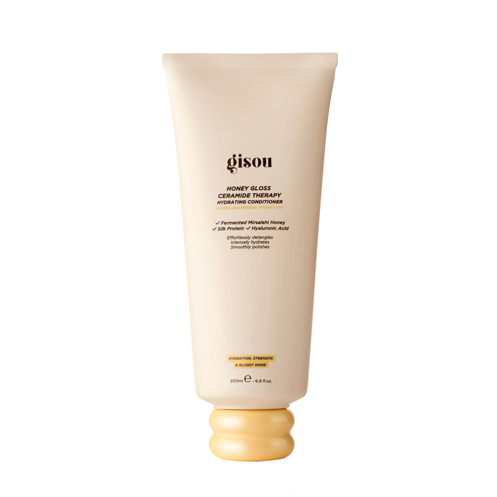 Gisou Honey Gloss Ceramide Therapy Hydrating Conditioner bottle delivers silky hydration.
