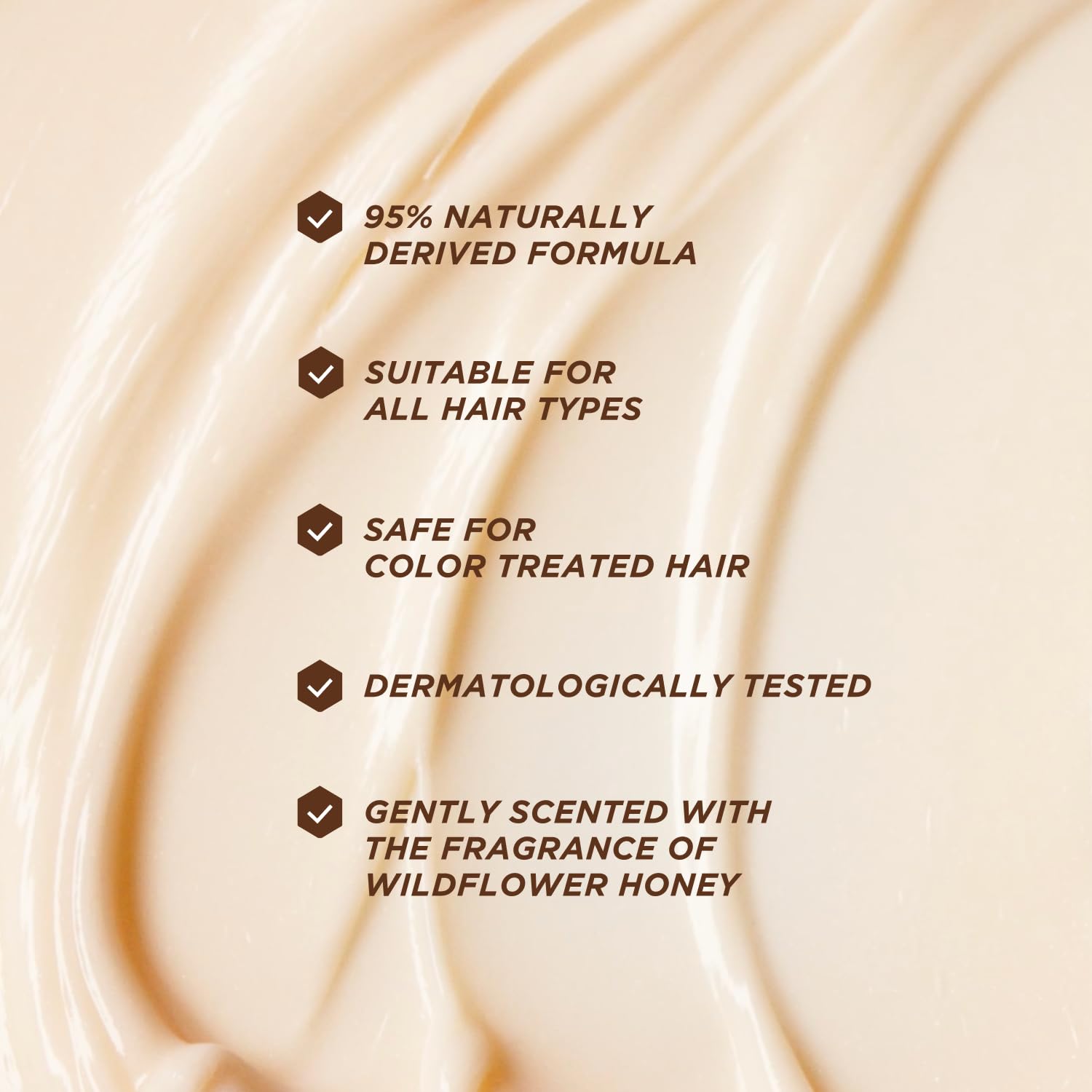 Gisou Honey Gloss Ceramide Therapy features ceramides and silk proteins for strength.