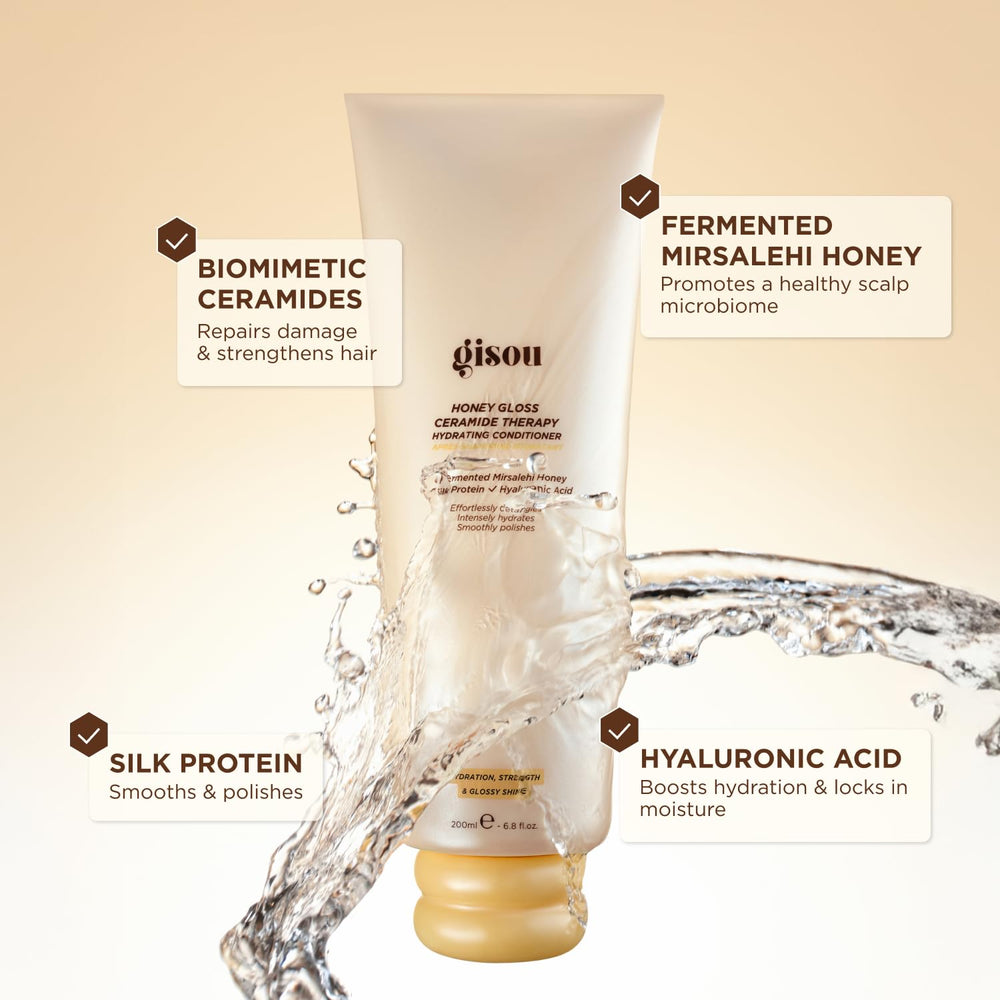 Gisou Honey Gloss conditioner being poured for easy detangling and shine.