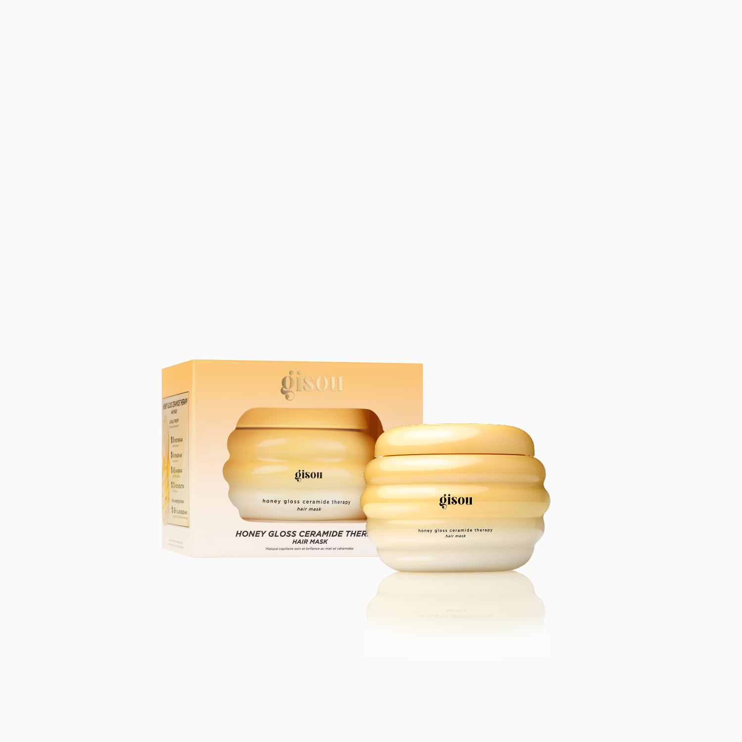 Gisou Honey Gloss Ceramide Therapy Mask closeup texture emphasizes creamy formula for smooth hair.