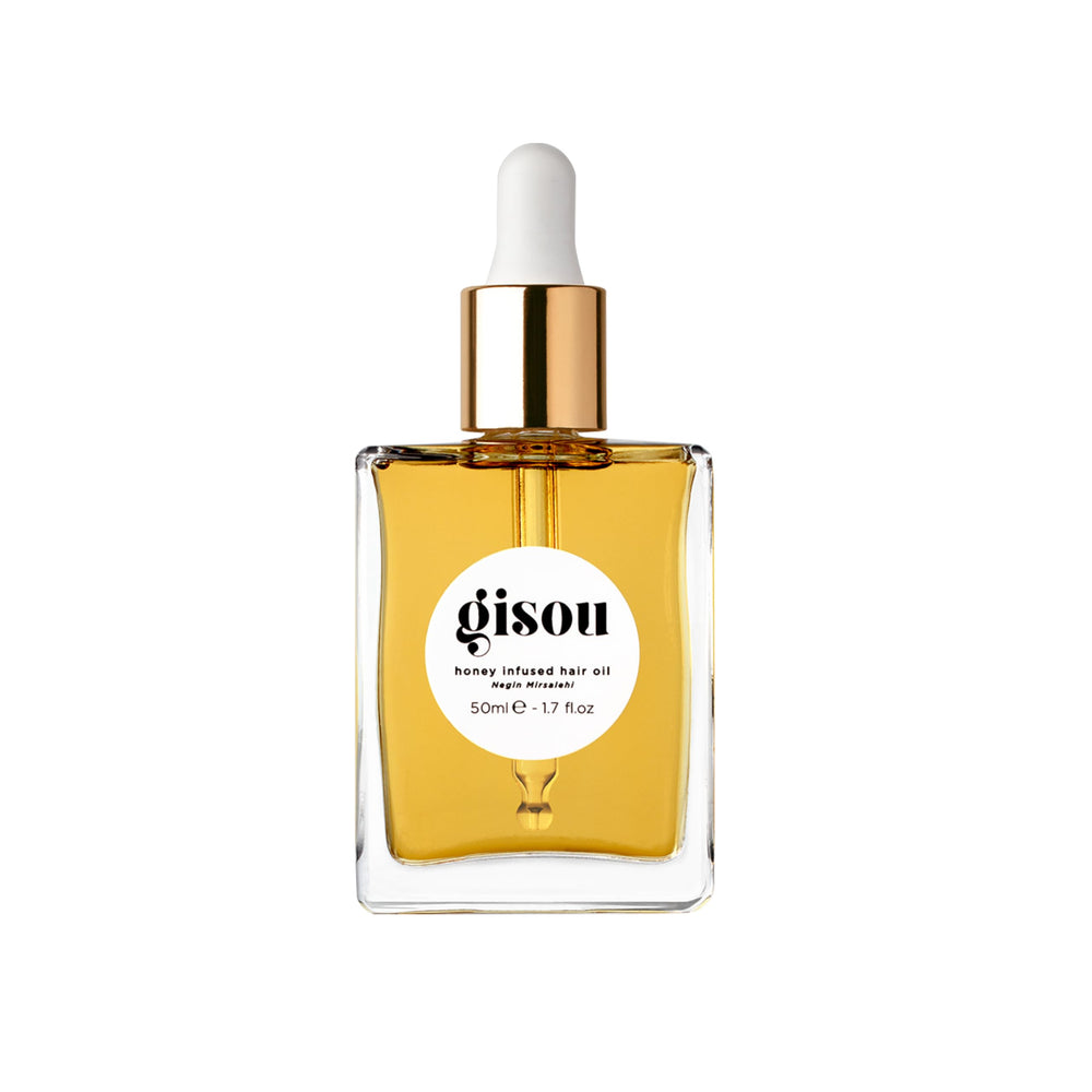 Gisou Honey Infused Hair Oil bottle close-up for instant shine and luxury hydration.