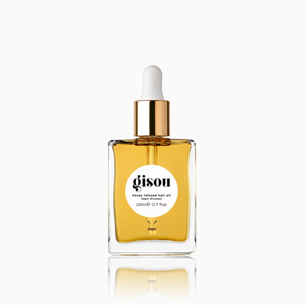 Gisou Honey Infused Hair Oil Mini bottle front showing premium hydration and shine