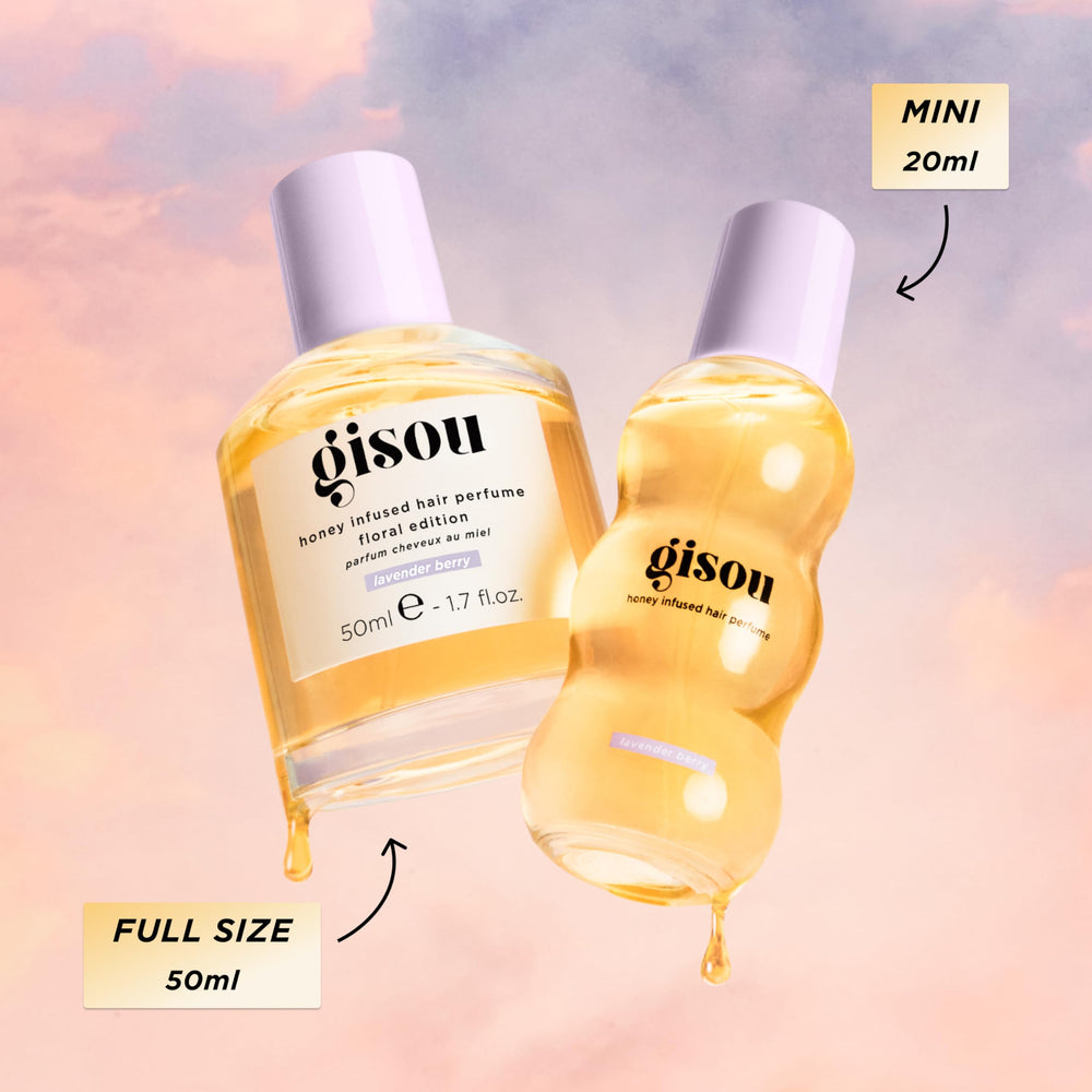 Gisou Honey Infused Hair Perfume Mini being applied to hair for freshness