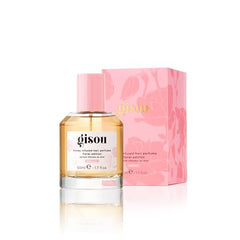 Gisou Honey Infused Hair Perfume mist on hair delivers lightweight fragrance and gloss.