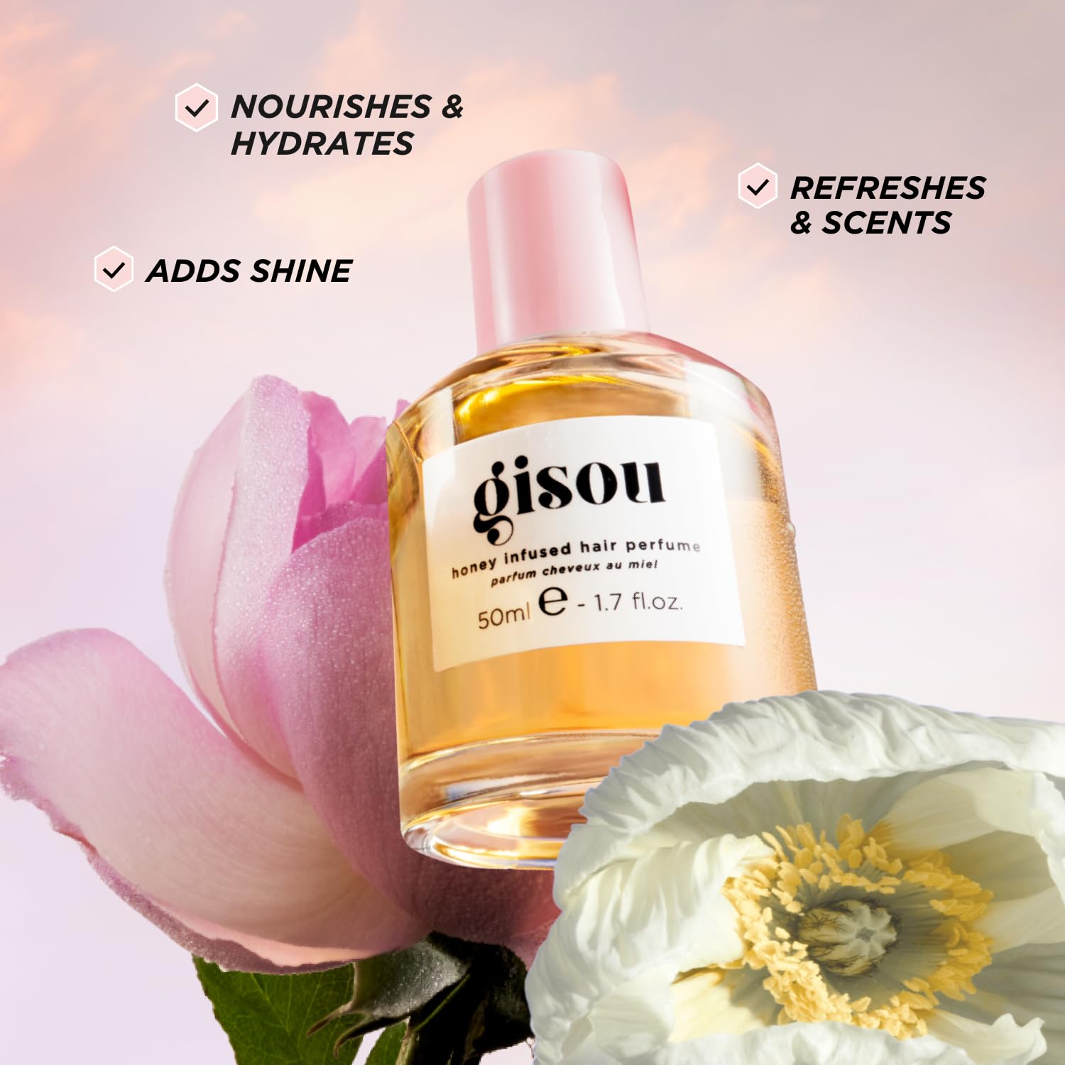 Gisou Honey Infused Hair Perfume Wildflower packaging highlights compact travel size for on-the-go refresh.