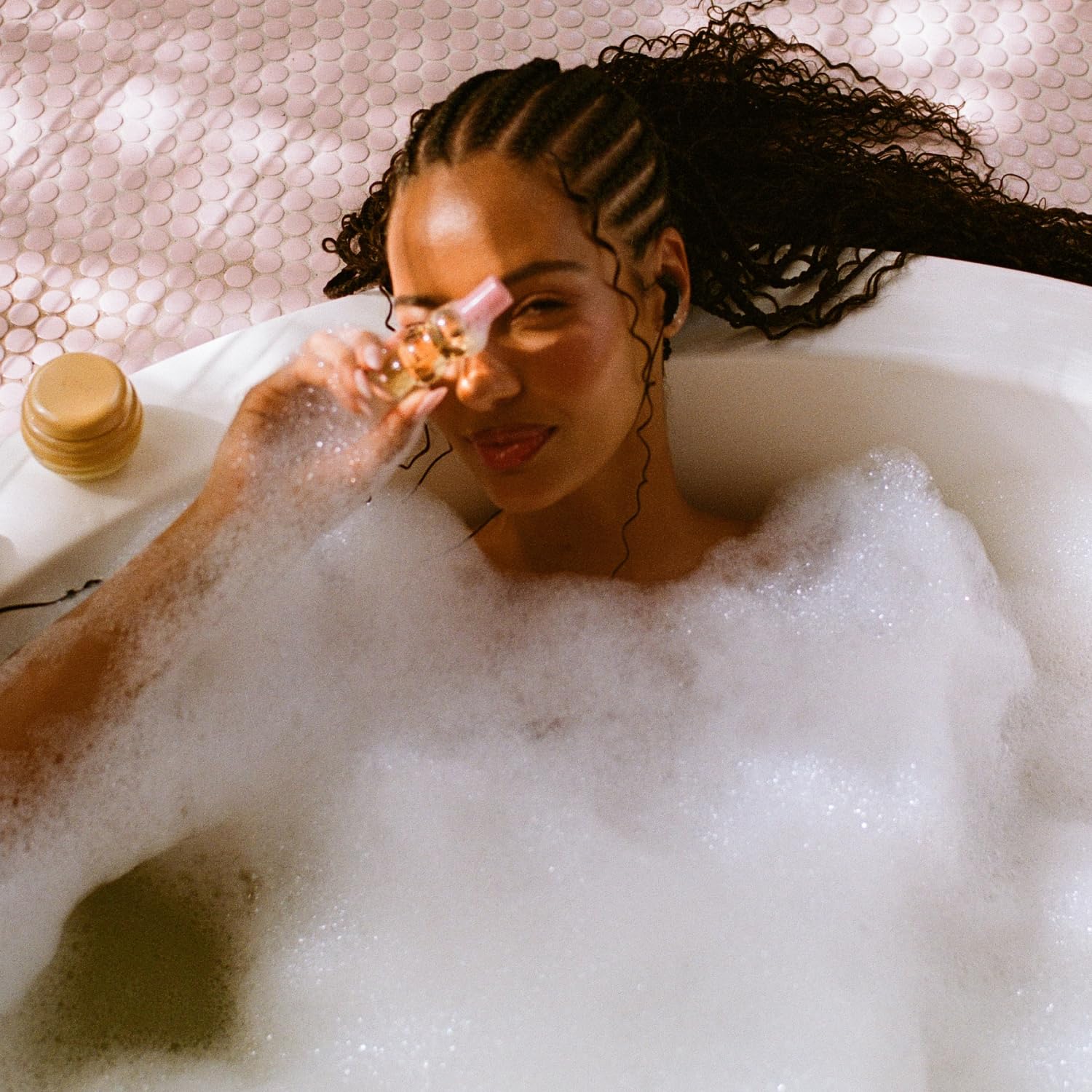 Gisou Honey Infused Hair Perfume Wildflower spray-on-hair view shows even distribution.
