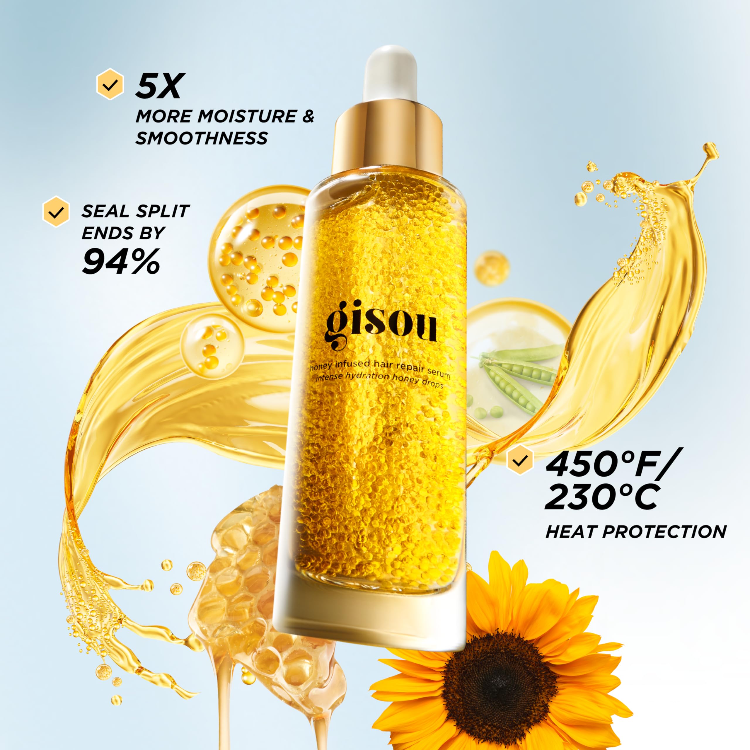 Gisou Honey Infused Serum dropper dispensing product on damp hair for moisture.